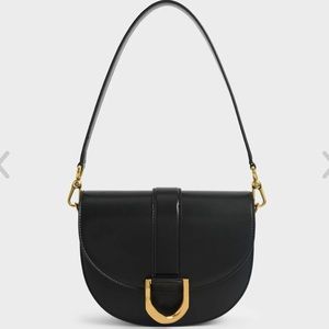 charles and keith gabine saddle bag black